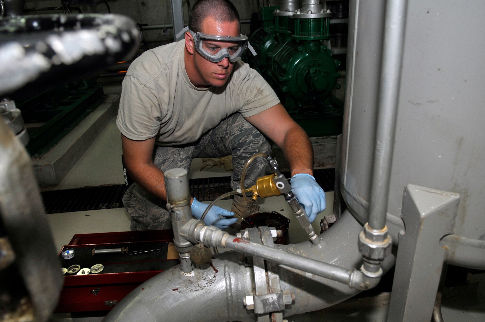 Staff Sgt. Jeremy DuBose, 332nd Expeditionary Logistics Readiness Squadron fuels lab NCO in charge, tests a sample of jet propellant 8 Sept. 24, 2010, Joint Base Balad, Iraq. The fuels lab tests JP-8 for cleanliness, water content and flash point, ensuring safe, quality fuel for the aircraft. Sergeant DuBose is a native of Kingston, Tenn., deployed from Shaw Air Force Base, S.C. (U.S. Air Force photo/Staff Sgt. Phillip Butterfield) 