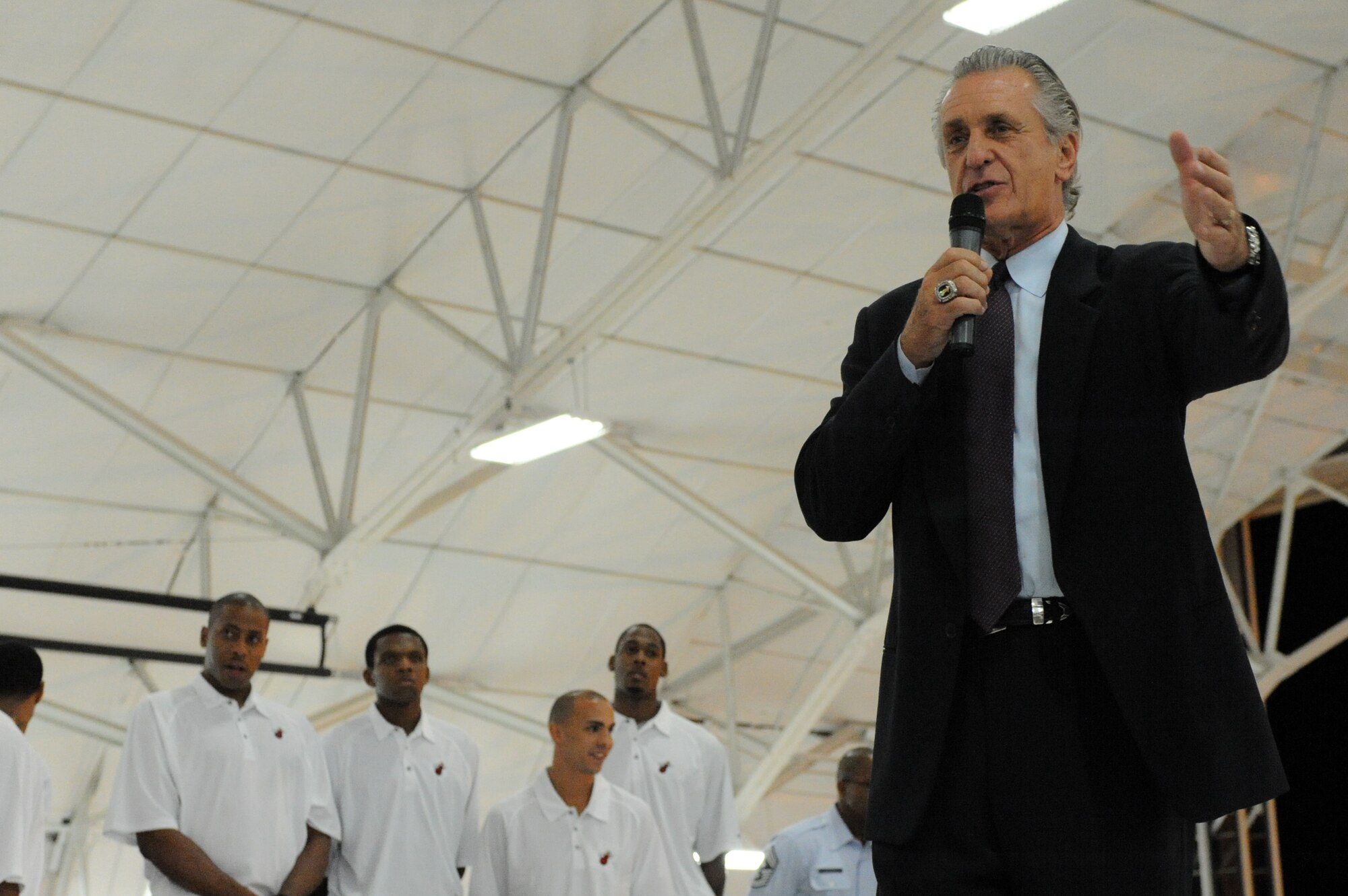 Pat Riley, Miami HEAT team president, says a few words during the Miami HEAT's arrival at Eglin Air Force Base, Fla., for their 2010 Training Camp at Hurlburt Field, Fla., Sep. 27, 2010. This is the first time in 23 years the HEAT has taken their training camp on the road.  Hurlburt Field will host the team's contingent of 44 from Sep. 28, through Oct. 3, 2010.  (DoD photo by Airman 1st Class Caitlin O'Neil-McKeown)
