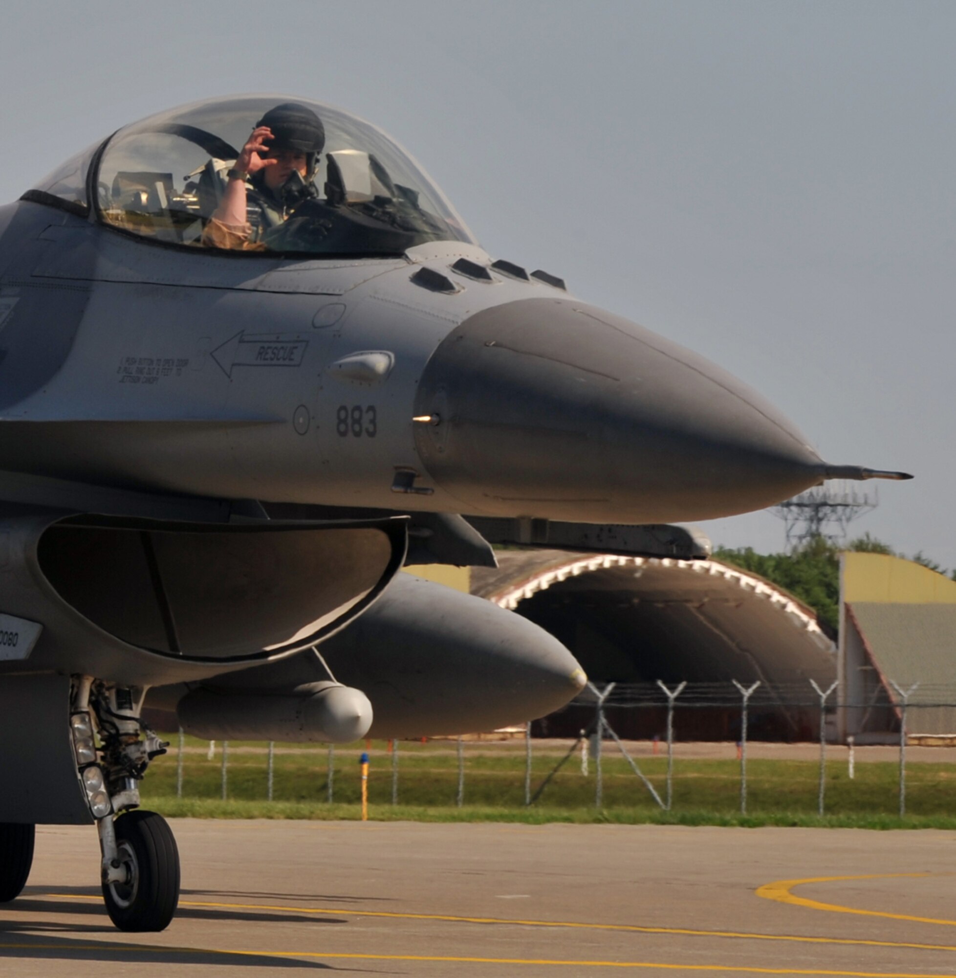 A U.S. Air Force pilot from Misawa Air Base, Japan?s 13th Fighter Squadron shows ?the claw? as he taxis his F-16 Fighting Falcon toward the runway, prior to taking off for a deployment Sept. 27, 2010. Members of the 13 FS are known as the "panthers", with ?the claw? being their common unifying gesture. (U.S. Air Force photo by Tech. Sgt. Russell McBride/Released)