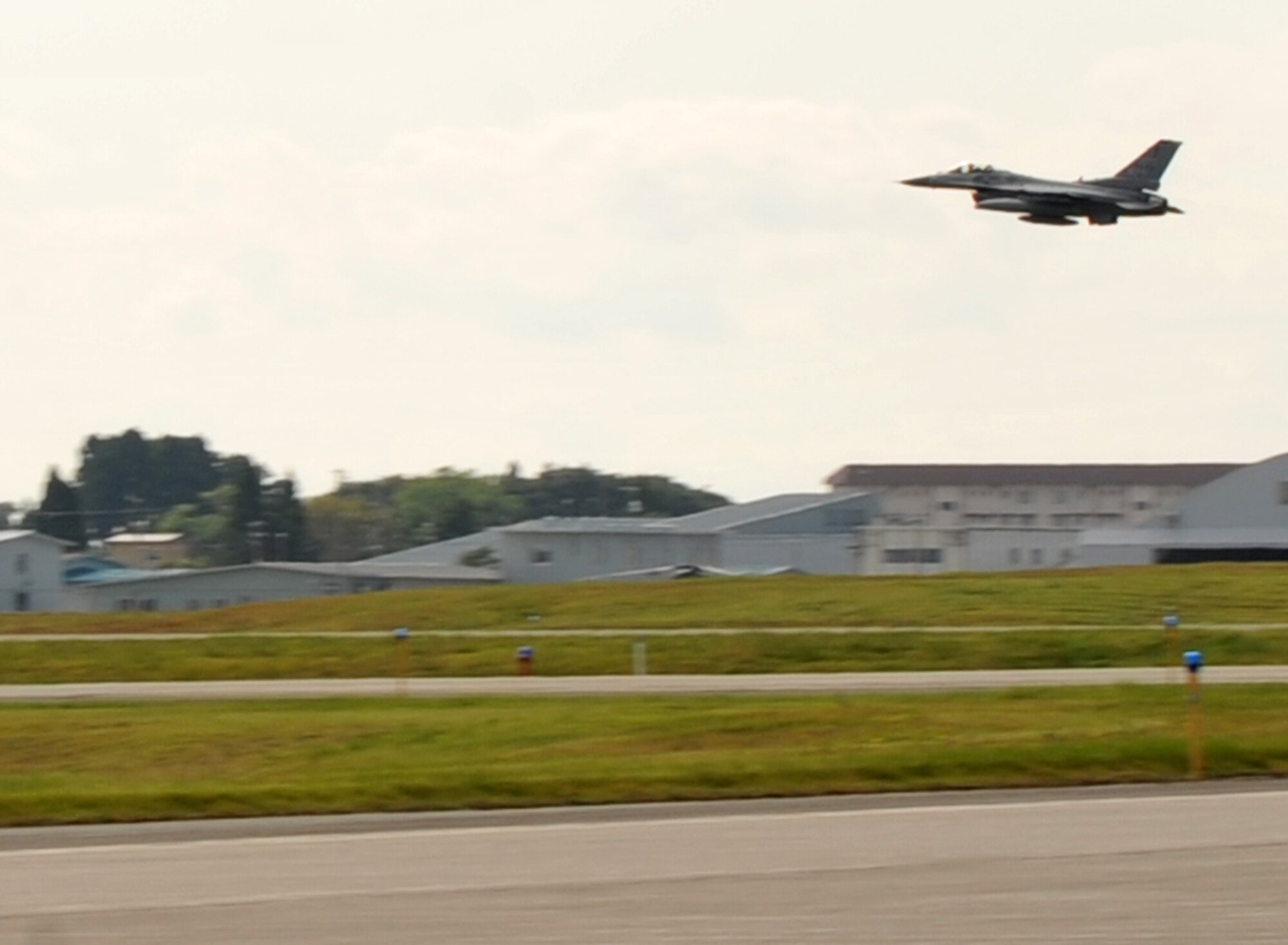 U.S. Air Force pilots from the 13th Fighter Squadron take off in an F-16 Fighting Falcon. The 13 FS deployed in support of Operation New Dawn, Sept. 27, 2010. The 13 FS is part of the 35th Operations Group, which deploys combat air assets worldwide. (U.S. Air Force photo by Tech. Sgt. Russell McBride/Released) 