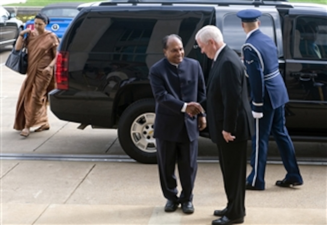 Secretary of Defense Robert M. Gates (2nd from right) greets Indian Defense Minister Arackaparambil Kurian Antony at the Pentagon on Sept. 28, 2010.  