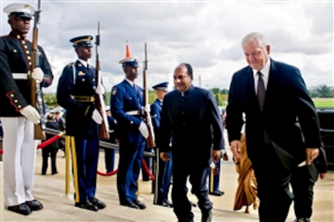 U.S. Defense Secretary Robert M. Gates escorts Indian Defense Minister Arackaparambil Kurian Antony through an honor cordon into the Pentagon, Sept. 28, 2010.