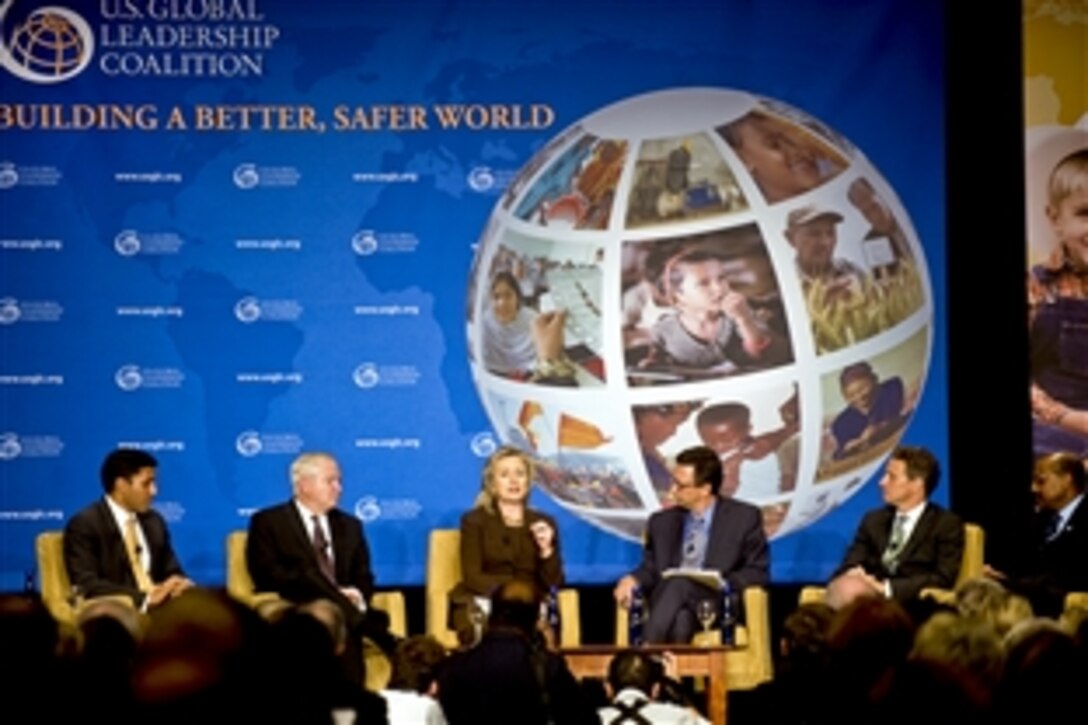 U.S. Agency for International Development Administrator Rajiv Shah, Defense Secretary Robert M. Gates, Secretary of State Hillary Rodham Clinton, moderator Frank Sesno, director of the School of Media and Public Affairs, George Washington University, Treasury Secretary Timothy Geithner, and Millennium Challenge Corporation CEO Daniel Yohannes take part in the U.S. Global Leadership Coalition  discussion in Washington, D.C., Sept. 28, 2010.