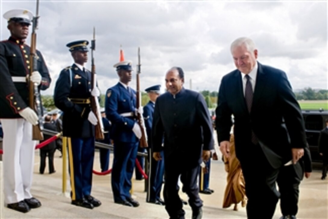 Secretary of Defense Robert M. Gates escorts Indian Defense Minister Arackaparambil Kurian Antony through an honor cordon and into the Pentagon on Sept. 28, 2010.  