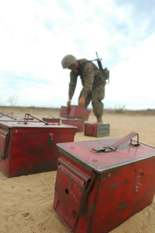 A Platoon 1026 recruit, attempts to catch up with his Platoon mates after carrying ammunition cans up and down a dirt road next to the 12-stall event of the Crucible at Edson Range, Marine Corps Base Camp Pendlton, Calif., Sept. 28. For Company B recruits, the consequence for failing mission or touching the red or unauthorized part of an obstacle of 12-stall, ammunition can carries up and down a nearby road was the consequence to teach recruits that there is always a  consequence to failure.