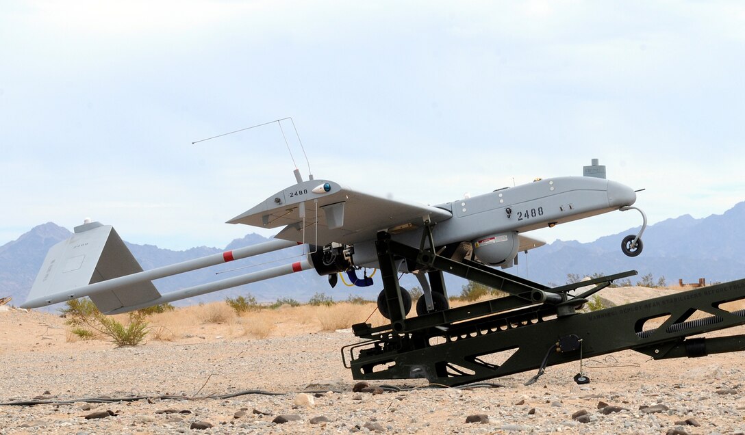 An RQ-7B Shadow unmanned aircraft prepares to shoot off from its launching device for the first time during Marine Unmanned Aerial Vehicle Squadron 4’s inaugural flight at Auxiliary Airfield 2 in Yuma, Ariz., Sept. 28, 2010. During the flight, the squadron showcased the aircraft’s reconnaissance and surveillance capabilities with a live video feed from the Shadow’s onboard camera. The Yuma detachment of the Texas-based reserve squadron is the only operational component of the unit and is composed of mostly active duty Marines. The detachment, which began assembling at the Marine Corps Air Station in Yuma, Ariz., in June, has four Shadows and consists of approximately 40 Marines.