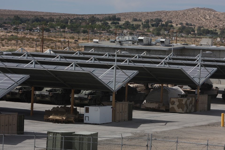 Newly installed solar panels on buildings 1801-1805 and 1210, power the entire 1st Tank Battalion compound. The panels produce renewable energy which helps the base not only go green, but contribute to the self-sufficiency of the base. (U.S. Marine Corps photo by Pfc. Sarah Anderson)::r::::n::