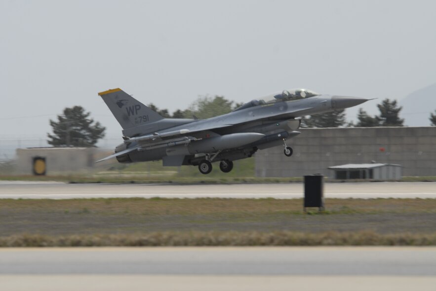 KUNSAN AIR BASE, Republic of Korea -- An 80th Fighter Squadron F-16 Fighting Falcon takes off from Kunsan Air Base in May 2010. The 8th Fighter Wing zeroed out its flying hour program Sept. 30 for 2010. (U.S. Air Force photo/Staff Sgt. Darnell Cannady)