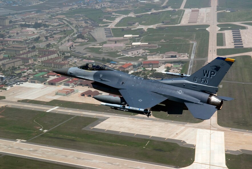 KUNSAN AIR BASE, Republic of Korea -- An 8th Fighter Wing F-16 Fighting Falcon flies over Kunsan Air Base in May 2010. The 8th FW zeroed out its flying hour program Sept. 30 for 2010. (U.S. Air Force photo/Master Sgt. Jason Wilkerson)