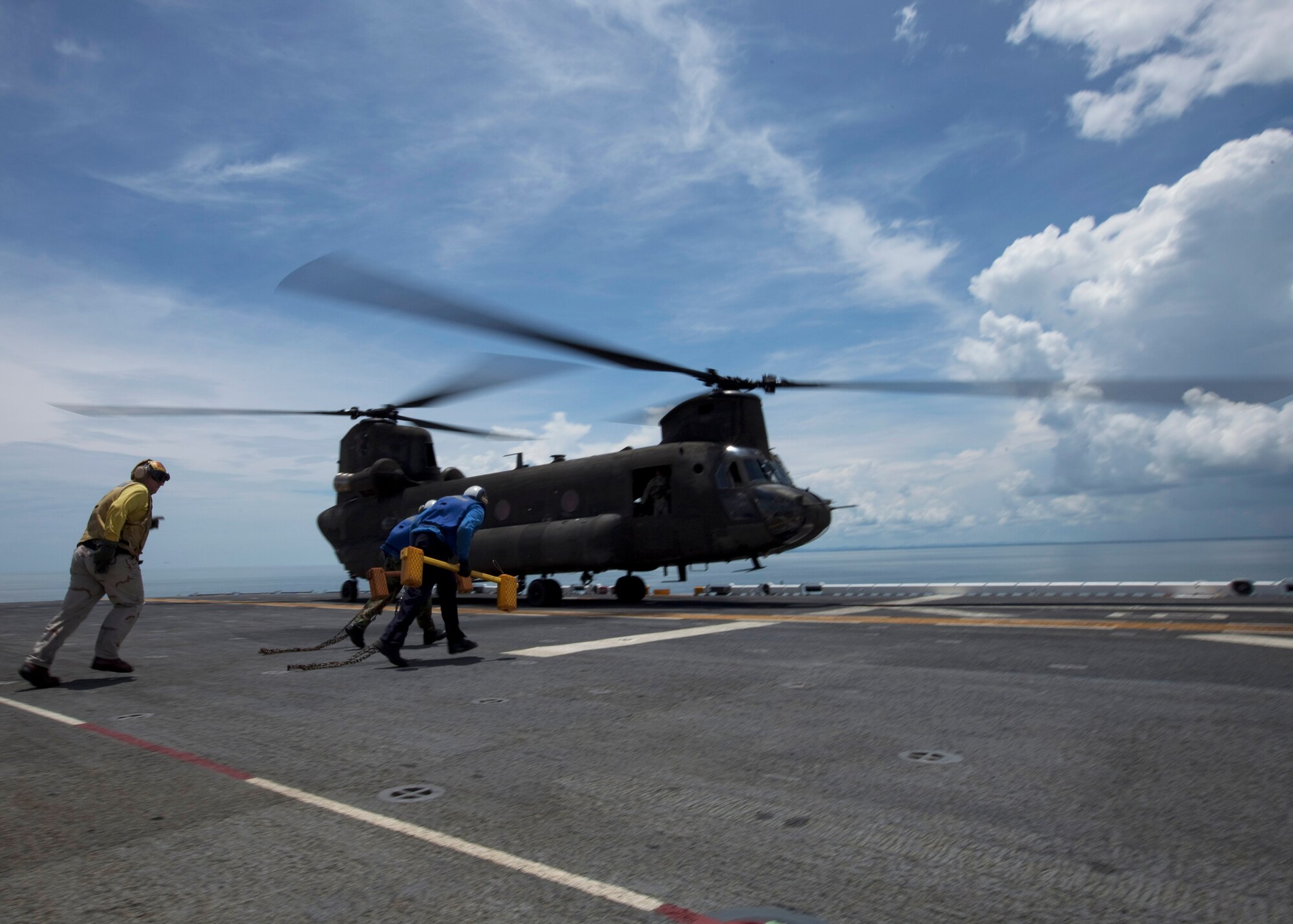 CARIBBEAN SEA --  A 1-228th Aviation Regiment CH-47F Chinook helicopter lands aboard amphibious assault ship USS Iwo Jima off the coast of Bluefields, Nicaragua, Sept. 20 in support of Operation Continuing Promise. U.S. servicemembers and civilians were deployed in support of Continuing Promise, providing humanitarian assistance, disaster relief and subject-matter exchanges to the Caribbean and Central and South America. (U.S. Marine Corps photo/Sgt. Samuel R. Beyers)
