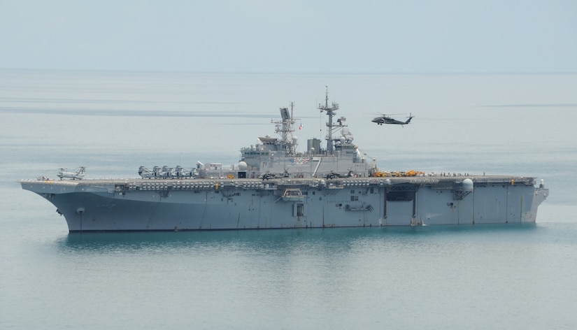 CARIBBEAN SEA --  A 1-228th Aviation Regiment UH-60 Black Hawk passes near the USS Iwo Jima while waiting for permission to land off the coast of Nicaragua here Sept. 22. The 1-228th assisted with Operation Continuing Promise from Sept. 15-24. (U.S. Air Force photo/Tech. Sgt. Benjamin Rojek)