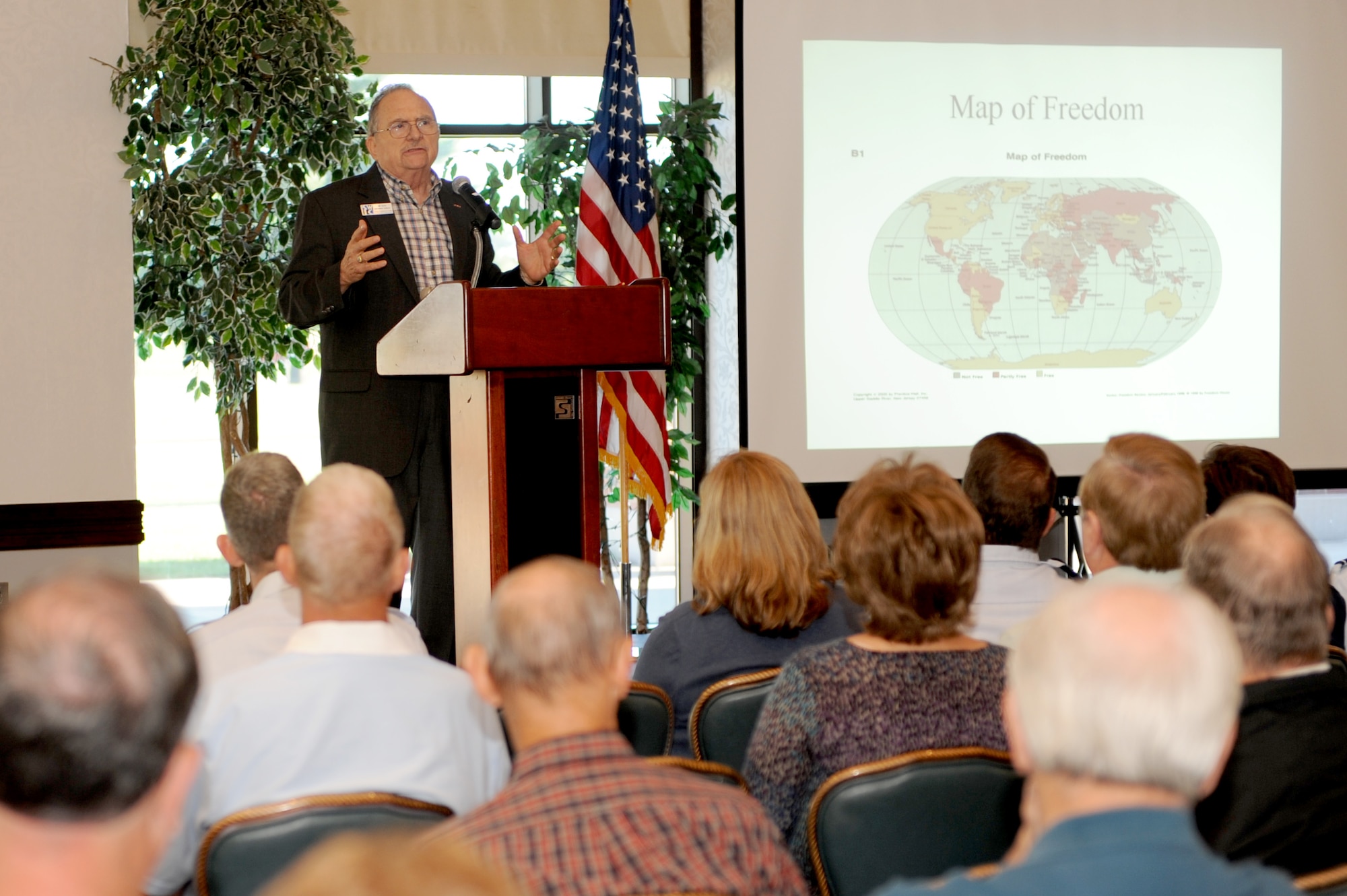 SCOTT AIR FORCE BASE, Ill. -- Retired Col. James Bohn, guest speaker, talks to attendees during Retiree Appreciation Day at the Scott AFB club, Sept. 25, 2010. At the event, retirees received valuable information about services available to them and were also invited on a base tour where they were able to see the fire department, a working dog demonstration and view the C-21 aircraft. (U.S. Air Force photo by Staff Sgt. Brian J. Valencia)