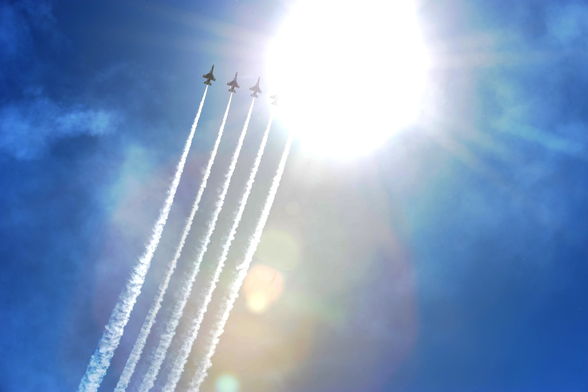 The Thunderbirds, the U.S. Air Force Air Demonstration Squadron, fly in formation over McConnell’s 2010 Open House, Sept. 26, 2010, McConnell Air Force Base, Kan.  More than 90,000 guests attended the open house Sept 25 through 26.  (U.S. Air Force photo/Staff Sgt. Dallas Edwards)