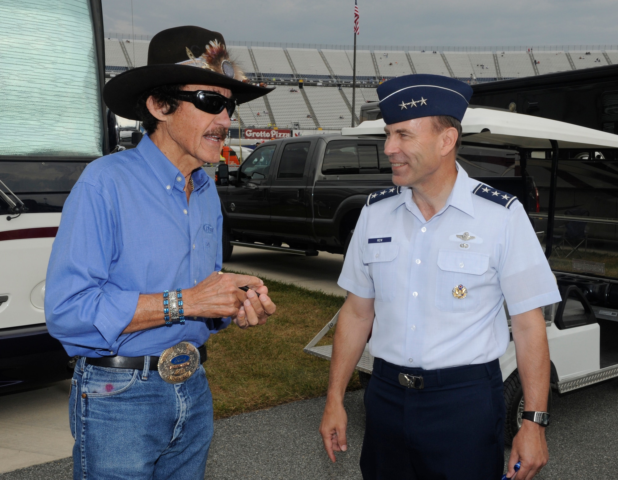 U.S. Air Force Lt. Gen. William Rew, Air Combat Command Vice Commander speaks with Seven-Time NASCAR Series champion and legend and current Air Force car owner Richard Petty before the start of the AAA 400 race at Dover International Speedway, Dover, Del., Sept. 26, 2010. (U.S. Air Force photo by John Sidoriak/Released)