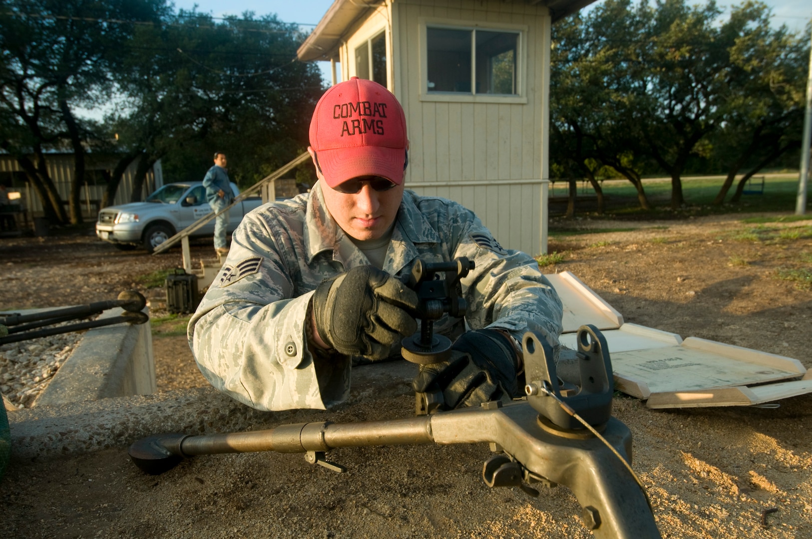SrA Jared Miller, 902 ABW/SFS sets up tripod for 7.62 cal machine gun qualifications at Camp Bullis, TX on 21 September 2010. (U.S. Air Force photo/Steve White)