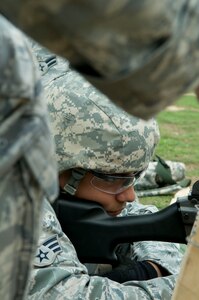SrA luis Gomez, 902 ABW/SFS fires m-249 machine gun for qualification before deployment. (U.S. Air Force photo/Steve White)
