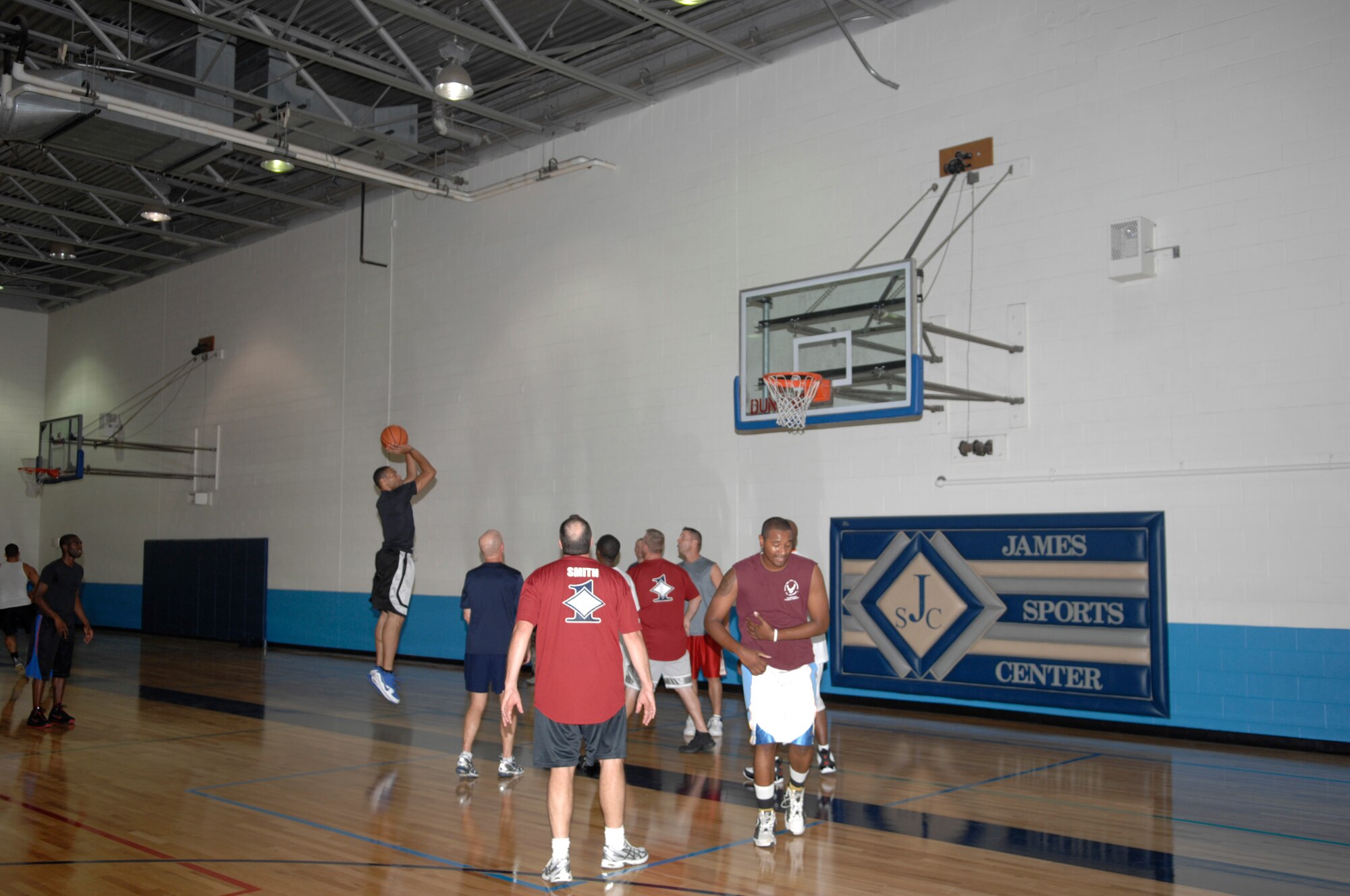 Members of team Scott compete in the Pro-Org Games Sept. 22 at the James Gym fitness center.  The First Sergeants played basketball against First Four during the 2nd Annual Pro-Org Games Sept. 20-22. First Four beat the First Sergeants and went on to beat Top 3 to take the title. The First Sergeants placed first in dodge ball and Top 3 placed first in wallyball. (U.S. Air Force photo/ Senior Airman Amber R. Kelly-Herard)