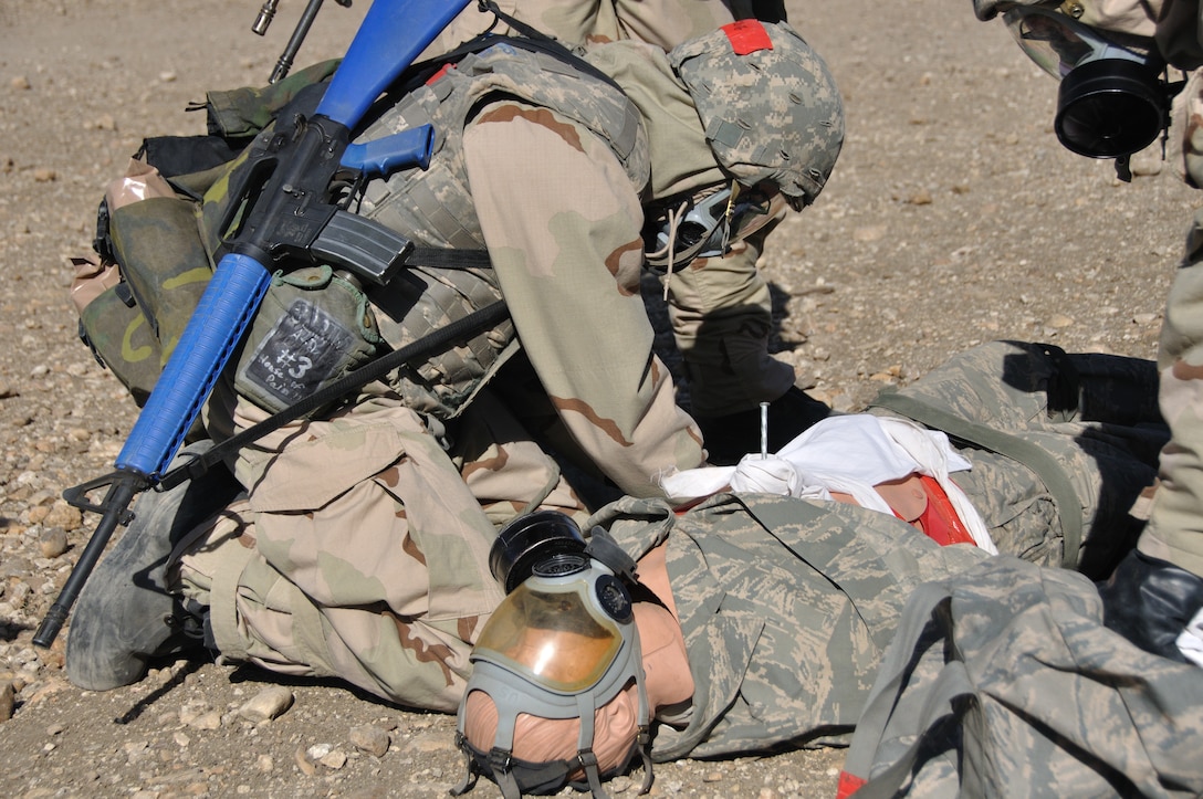 A simulated casualty receives first aid during a BEAST exercise. (U.S. Air Force Photo/Melinda Mueller)
