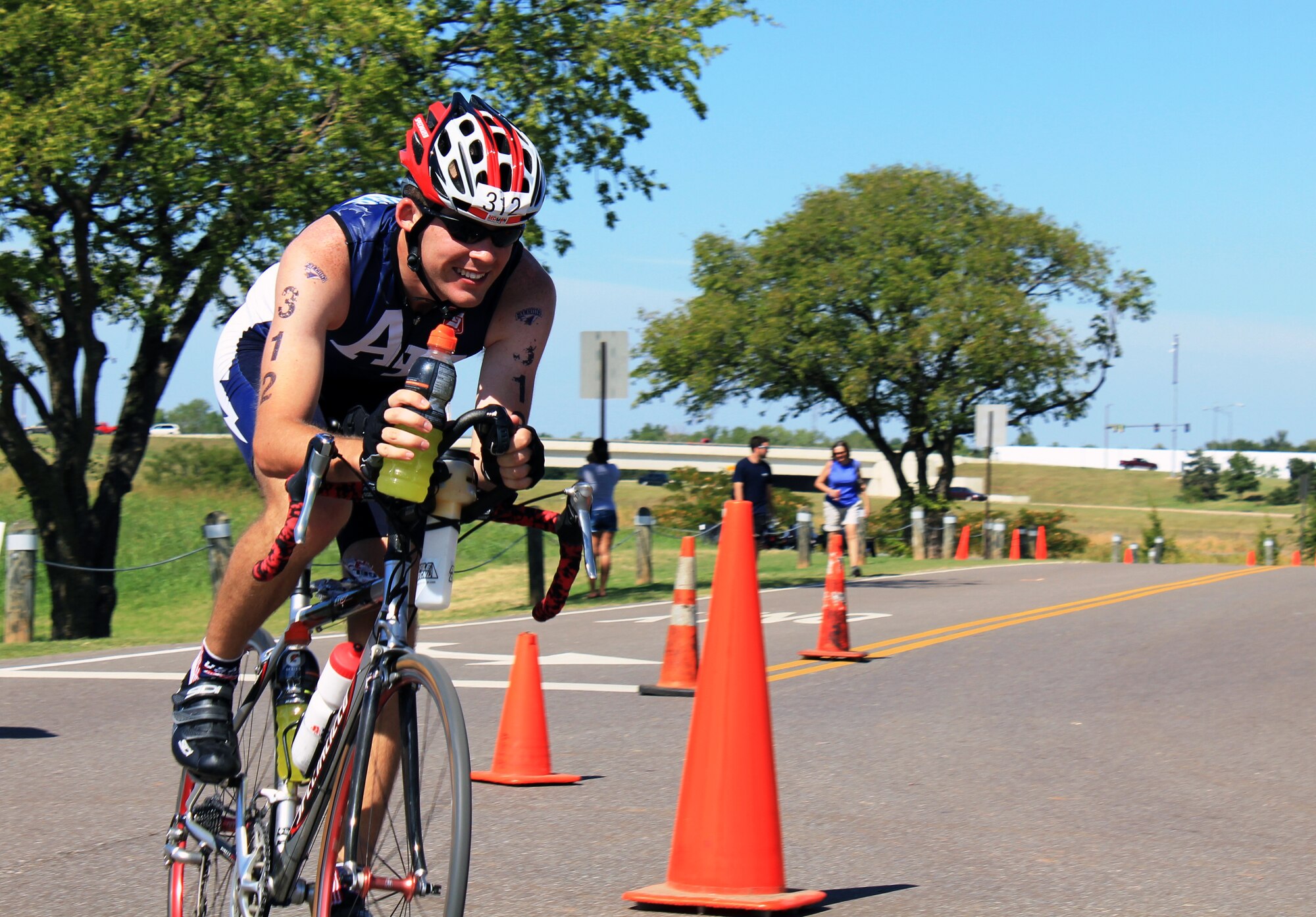 Cadet 3rd Class Brad Phelan makes his way through the bike course Saturday, Sept. 25, 2010 during the Redman Triathlon in Oklahoma City.  Phelan and two other cadets raced in the event representing the Air Force Academy Triathlon Club. (Courtesy Photo)