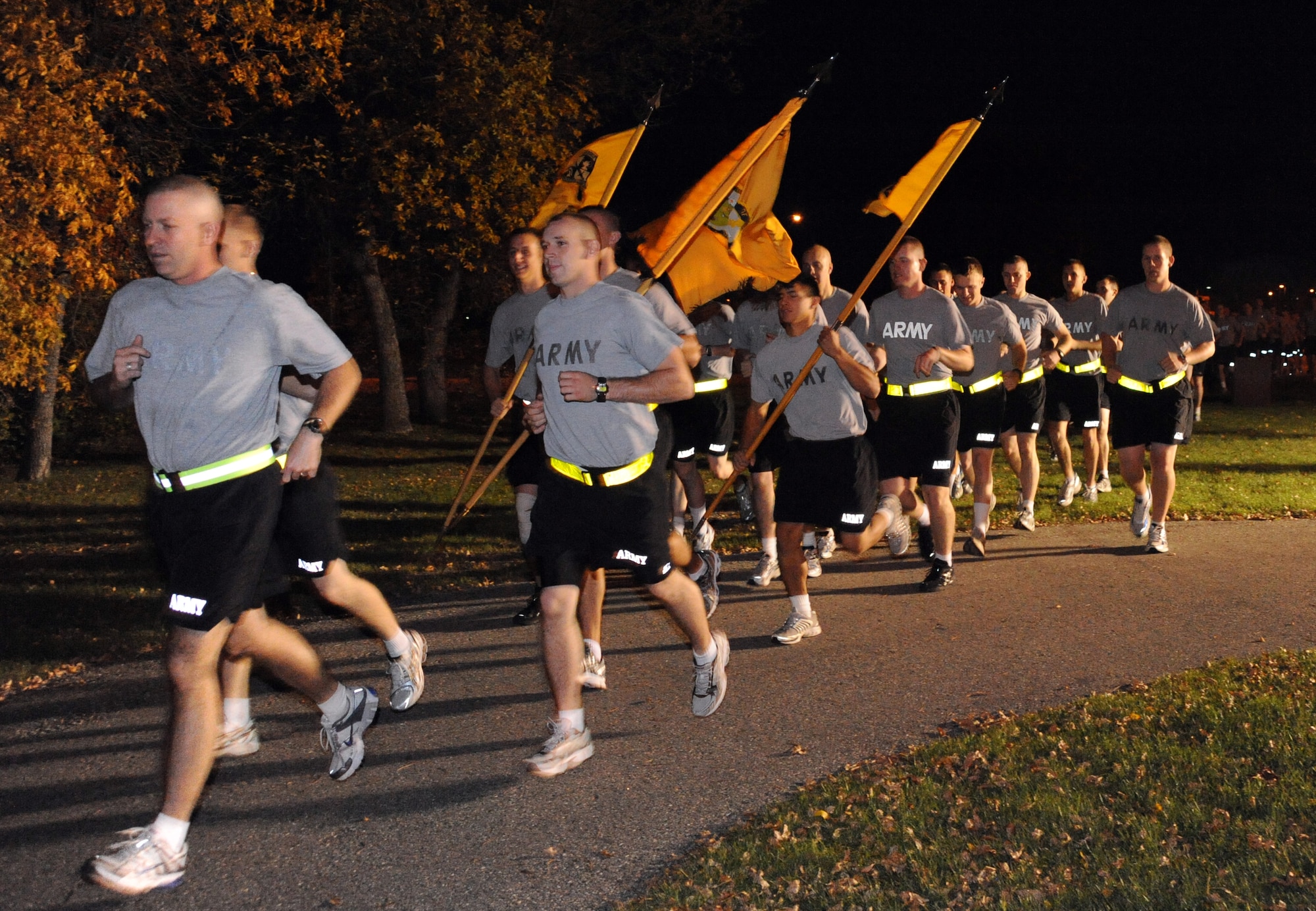 Cadets from the University of North Dakota Army Reserve Officer Training Corps Fighting Sioux Battalion run in formation during the Full Moon 5K run Sept. 28 on the Grand Forks Air Force Base’s 5K running trail. More than 200 people from the base and community participated in the run. SMSgt. Brian Schulenberg, 319th Force Support Squadron finished first place out of the male participants with a time of 22 minutes and five seconds. Army ROTC cadet Van Hought finished first out of the female participants with a time of 22 minutes and 30 seconds.