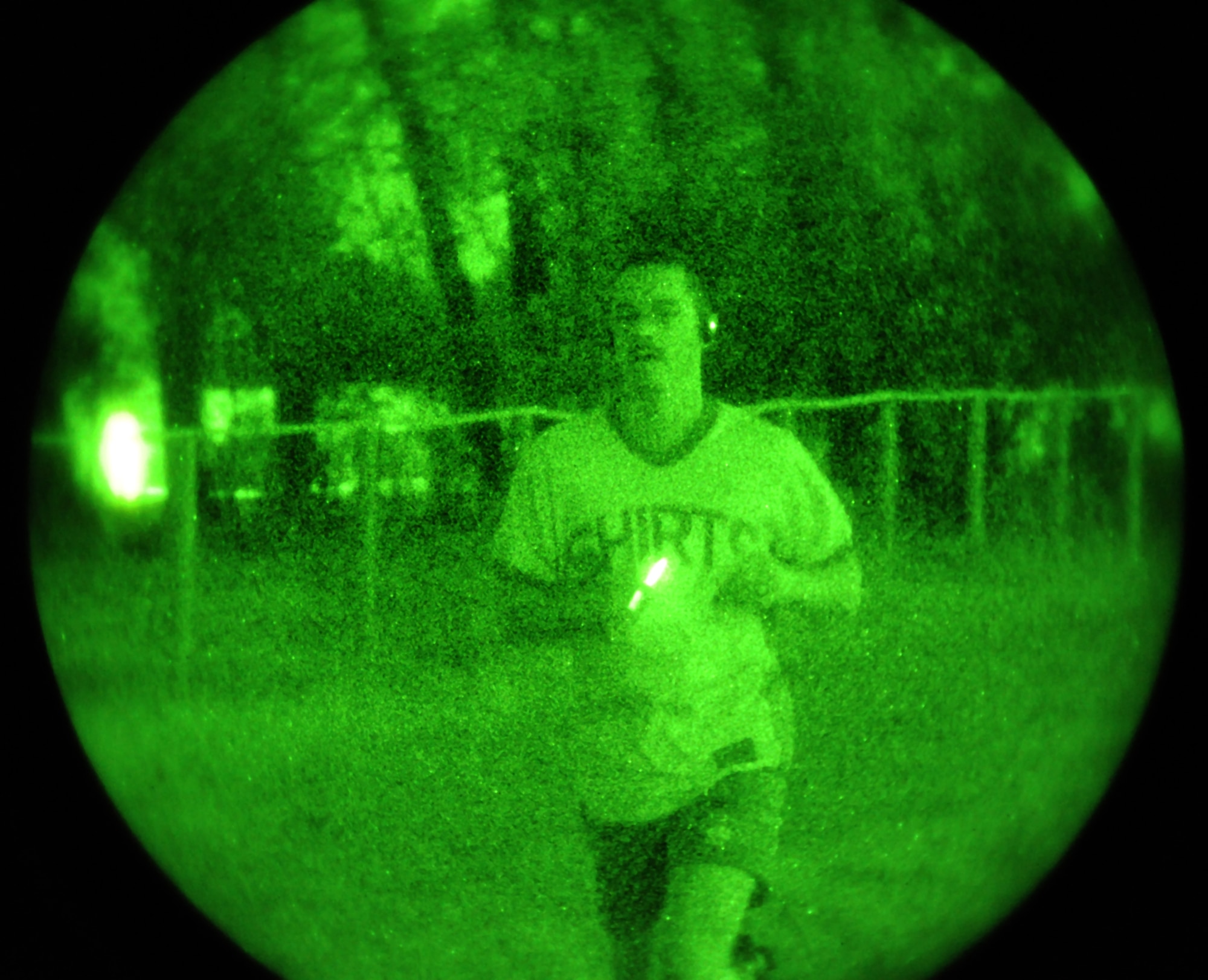 Senior Master Sgt. Keith Waltz, 319th Communications Squadron first sergeant, listens to music as he participates in the Full Moon 5K run Sept. 28 on the Grand Forks Air Force Base’s 5K running trail. More than 200 people from the base and community participated in the run. SMSgt. Brian Schulenberg, 319th Force Support Squadron finished first place out of the male participants with a time of 22 minutes and five seconds. Army ROTC cadet Van Hought finished first out of the female participants with a time of 22 minutes and 30 seconds.