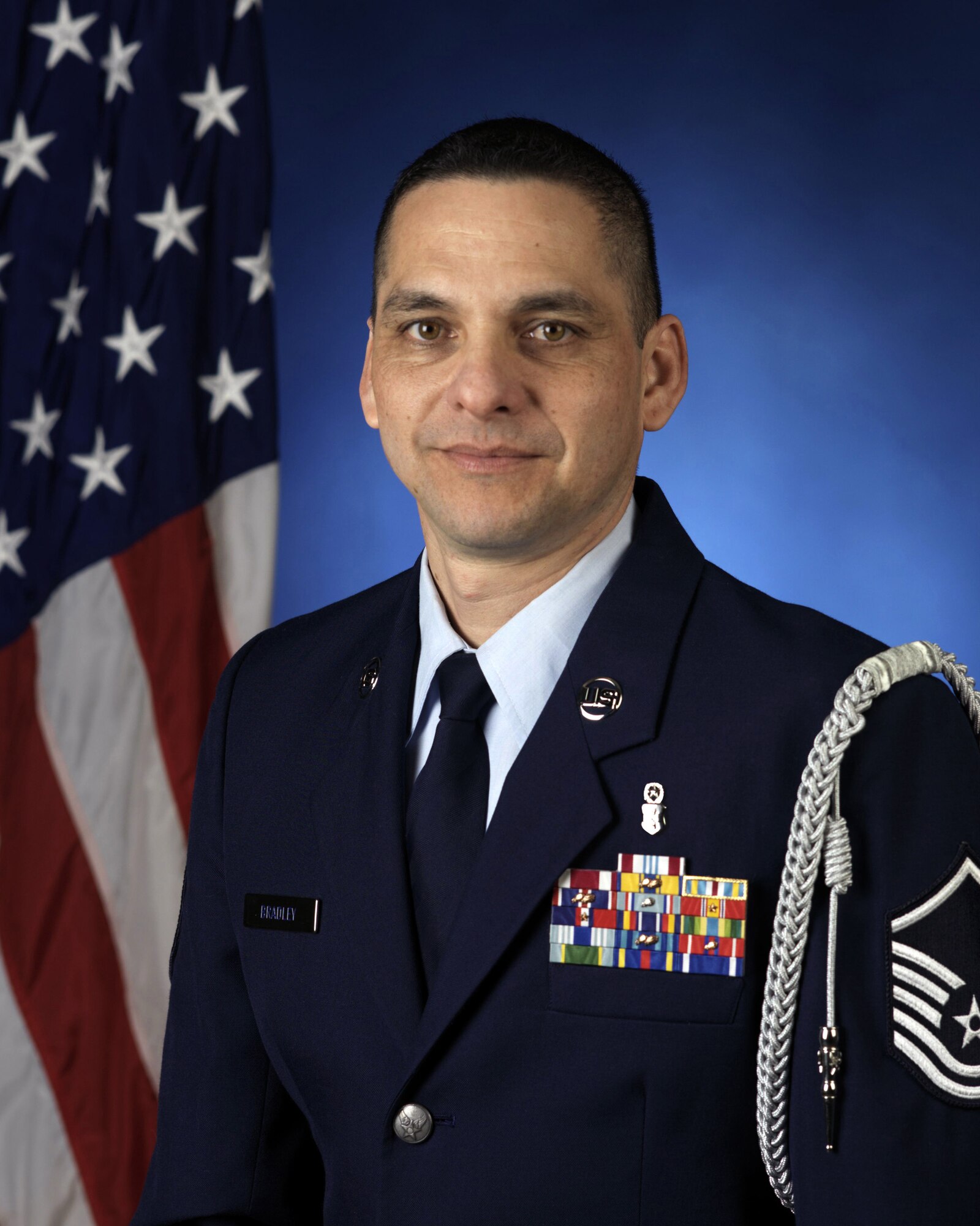 Official U.S. Air Force photo of Master Sgt. Emile Bradley enlisted aide to Lt. Gen. Dana T. Atkins, 11th Air Force commander, Joint Base Elmendorf-Richardson.