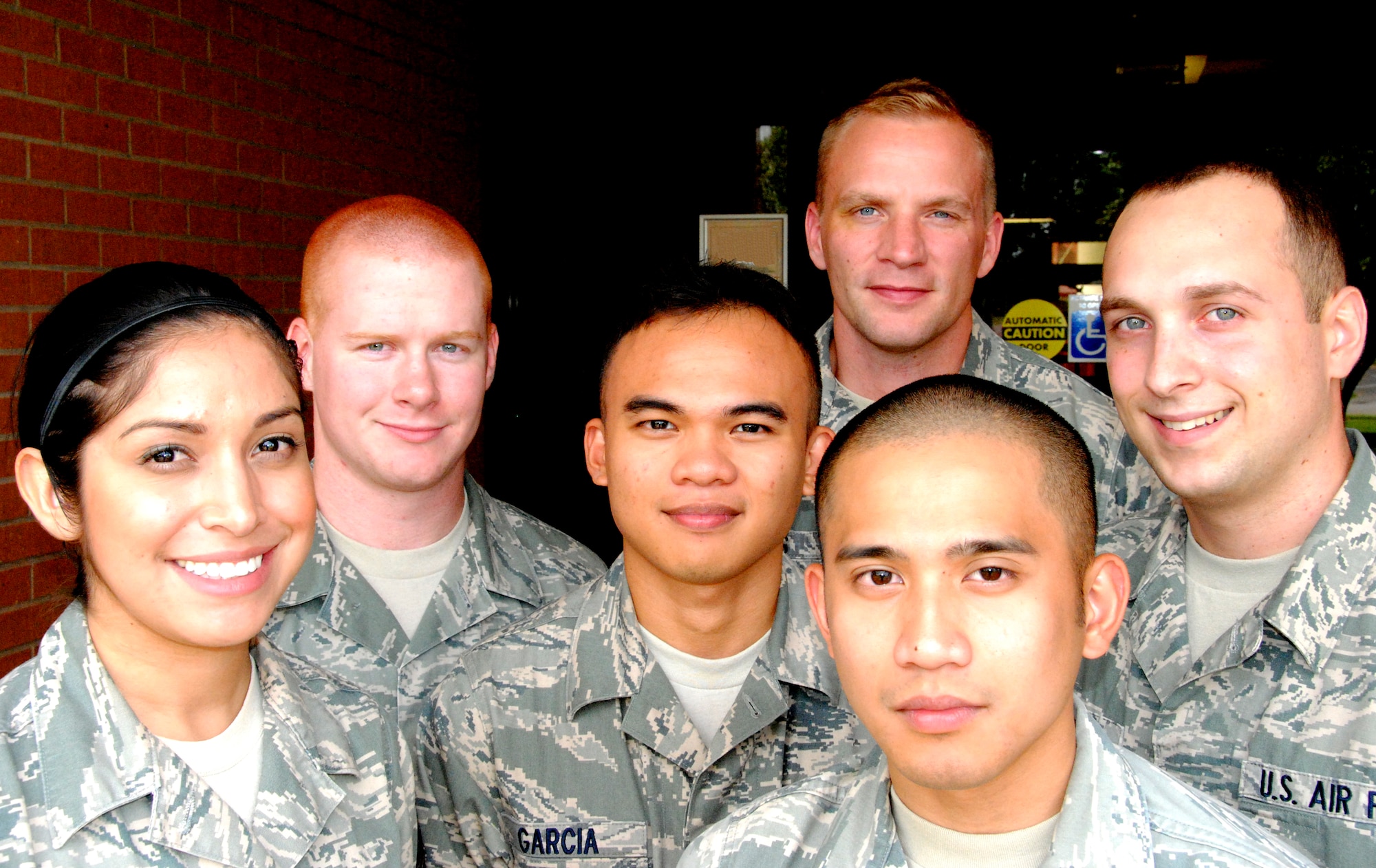 The Warriors of the Week are: from left, Airman 1st Class Ana Pelais, Airman 1st Class Shaun Houlihan, Airman 1st Class Ryan Garcia, Staff Sgt. Chris Endres, back row, Airman 1st Class Mark Tumbagon, front row, Airman 1st Class Eric Klender, and Airman 1st Class Jesse Kow, not in photo. (U.S. Air Force photo)