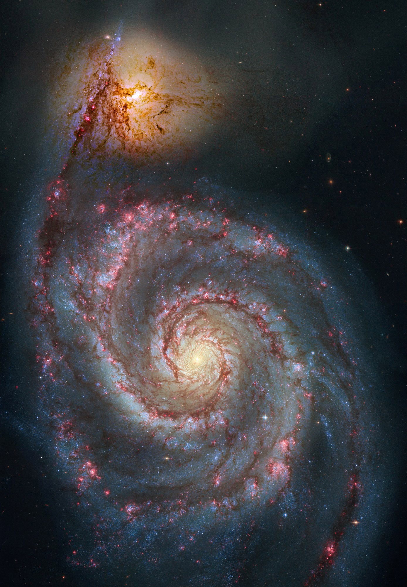 Data from the Hubble Space Telescope's Advanced Camera for Surveys was reprocessed to produce this image of the colliding galaxies known as Messier 51 or M51. The galaxies, which lie about 23 million light-years from Earth, were first discovered by Charles Messier in 1774. (NASA Image/S. Beckwith and Robert Gendler)
