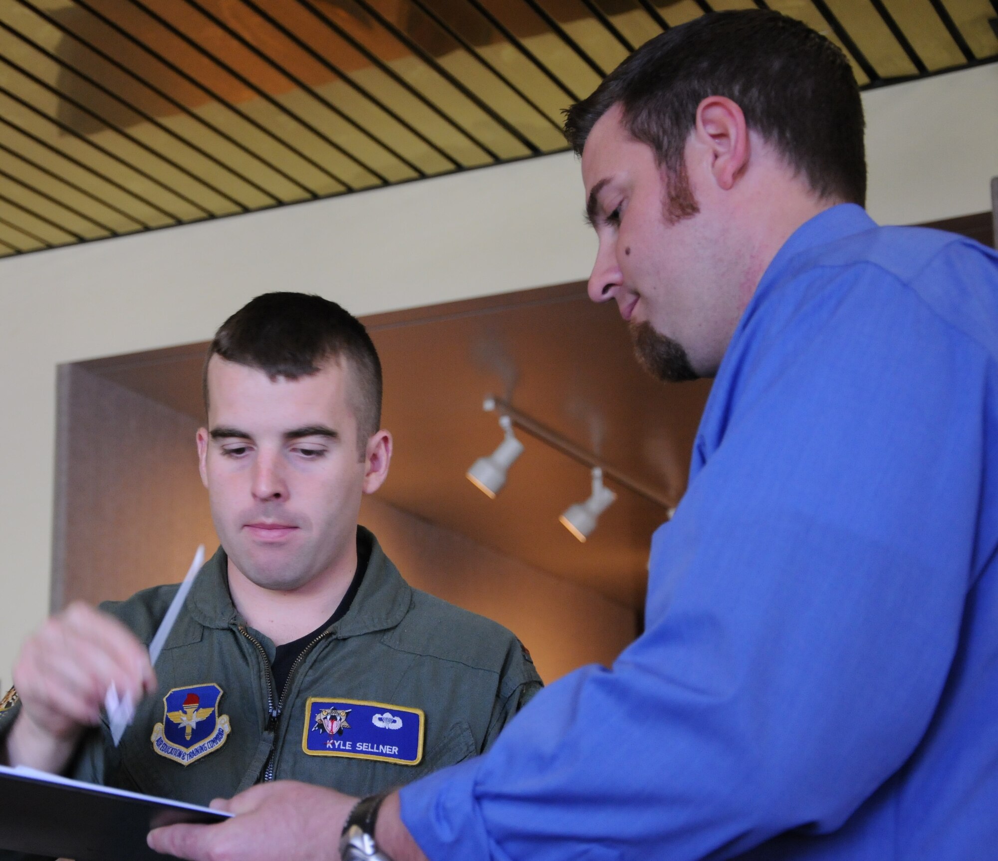 LAUGHLIN AIR FORCE BASE, Texas – Second Lt. Kyle Sellner, a Laughlin Air Force Base student pilot, self administers a DNA swab for voluntary registration into the National Marrow Donor Program. The NMDP was established in 1986 as a means to match unrelated donors to patients in need of a blood stem cell transplant, but lack any family members with the suitable tissue match. Registration is taking place at Anderson Hall and Losano Fitness Center until 5 p.m. and at the Base Exchange until 4 p.m. (U.S. Air Force photo by 2nd Lt. Kenneth Gilbert)
