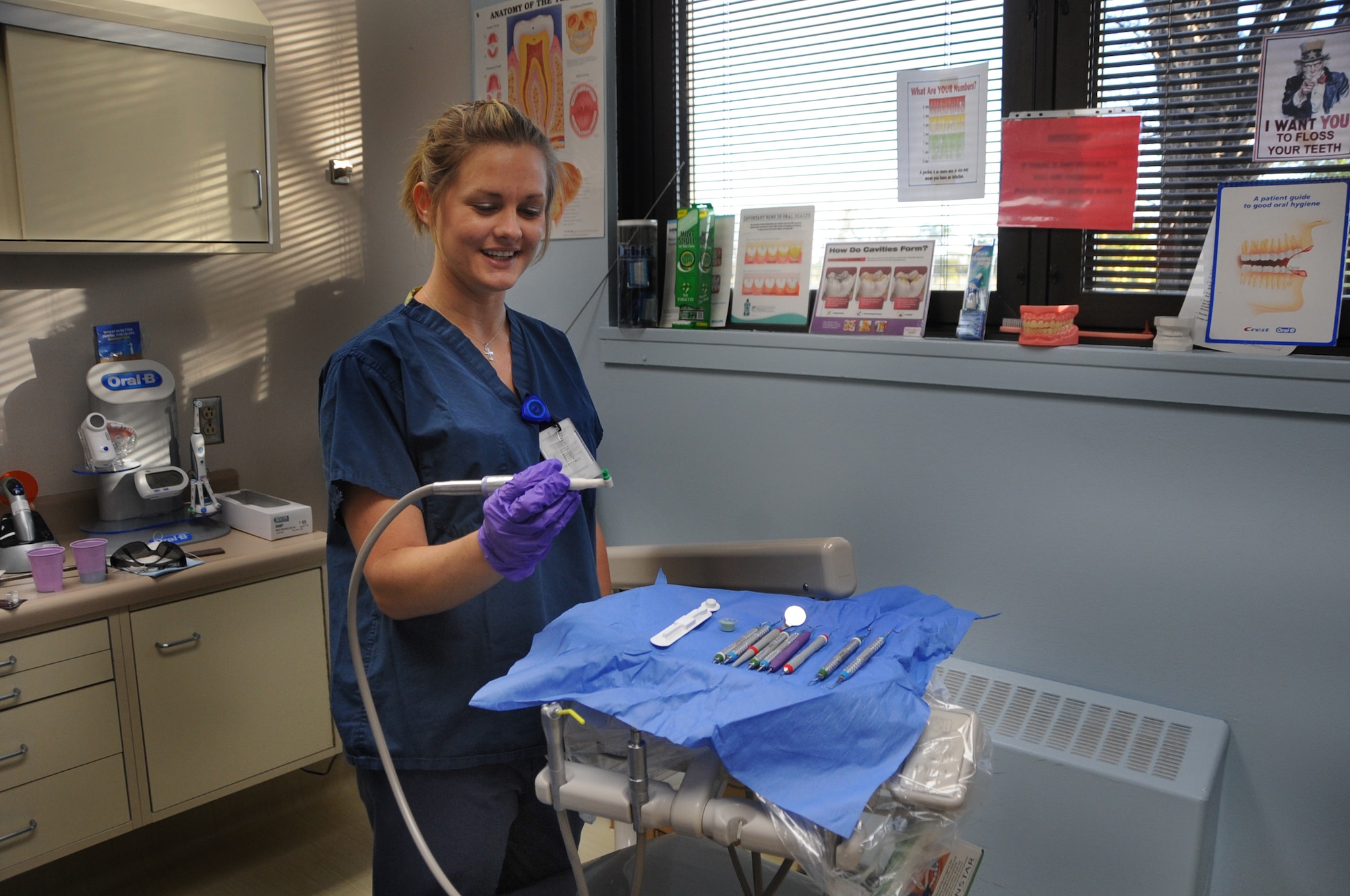 ELLSWORTH AIR FORCE BASE, S.D. -- Staff Sgt. Kristen Pool, 28th Medical Operations Squadron dental hygienist, displays the tools she uses during a dental cleaning, Sept. 27.  Sergeant Pool, formally a dental technician, is now the only dental hygienist on Ellsworth AFB. (U.S. Air Force photo/Airman 1st Class Anthony Sanchelli)