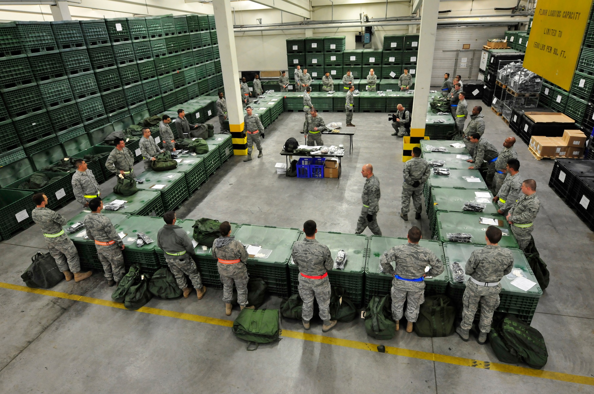 U.S. Air Force Airmen are issued individual protective equipment in
preparation for an Operational Readiness Inspection, Ramstein Air Base,
Germany, Sept. 28, 2010. Ramstein has been preparing for more than nine
months for the ORI, which is designed to test Airmen's ability to survive,
operate and perform fundamental duties in a war time environment. (U.S. Air
Force photo by Staff Sgt. Stephen J. Otero/Released)
