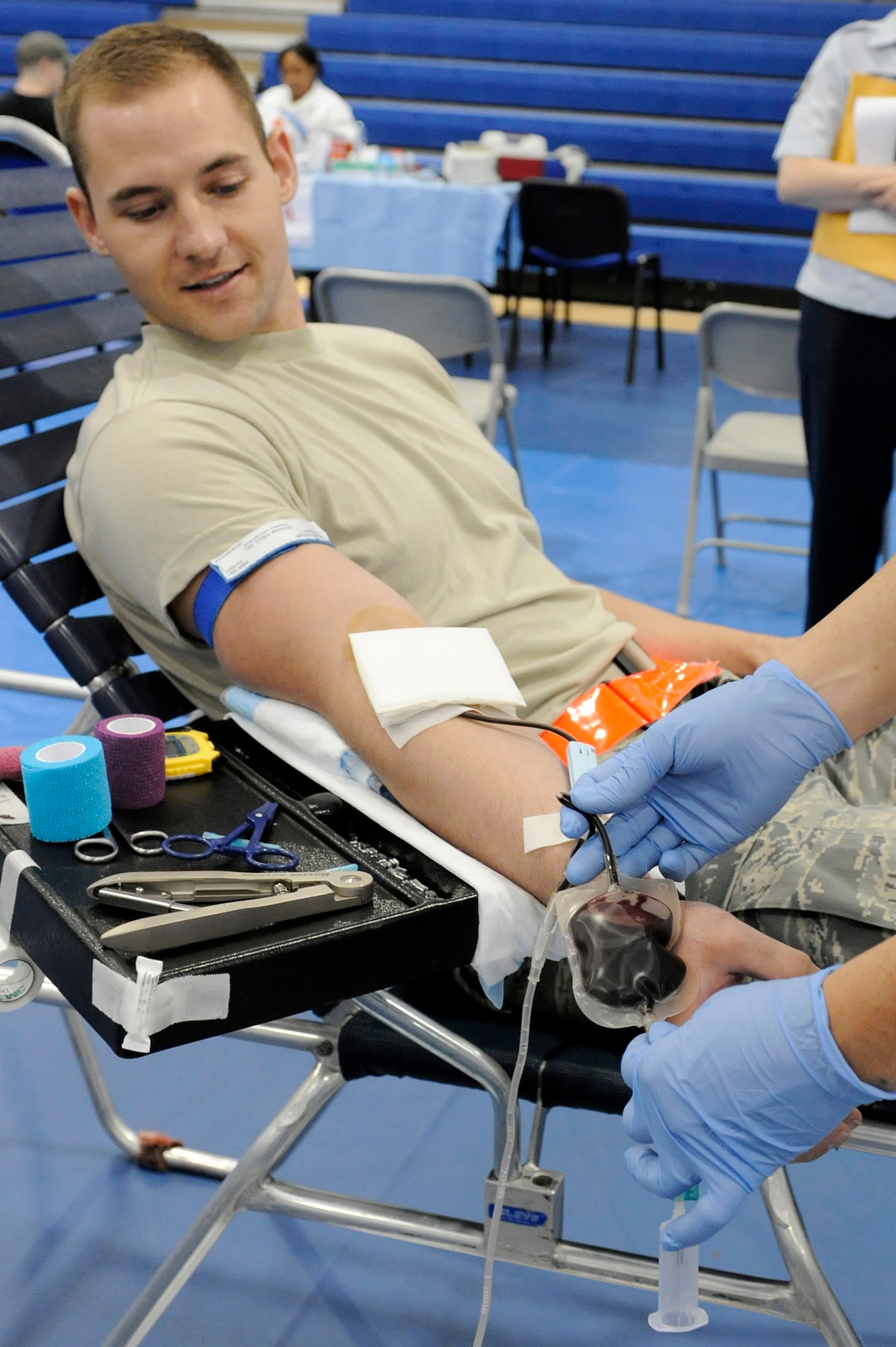 ROYAL AIR FORCE LAKENHEATH, England -- Airman 1st Class Scott Schreiber, 48th Maintenance Operations Squadron analyst, gets blood drawn during the Armed Services Blood Program held at the fitness center Sept. 27. The ASBP team was at RAF Lakenheath Sept. 27 and 28. (U.S. Air Force photo/Airman 1st Class Lausanne Morgan)