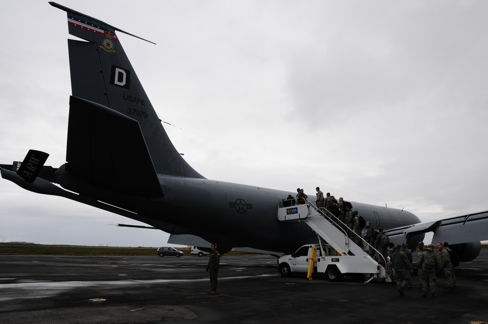 KEFLAVIK, Iceland – Airmen at the Keflavik International Airport board a KC-135 Stratotanker from the 100th Air Refueling Wing at RAF Mildenhall, England, after completing their rotation of NATO’s Icelandic Air Policing Mission on Sept. 24. The 493rd Expeditionary Fighter Squadron provided air sovereignty for Iceland from Sept. 6, when the squadron achieved full operational capable status, until their departure Sept. 24. The IAP mission is conducted as part of NATO's mission of providing air sovereignty for member nations and has also been conducted by France, Denmark, Spain and Poland. (U.S. Air Force photo/Senior Airman Stephen Linch)