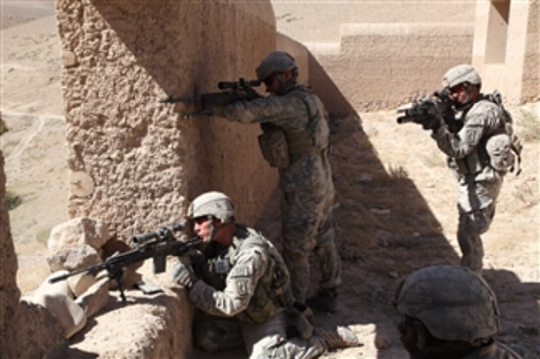 U.S. Army soldiers with 3rd Platoon, Alpha Company, 1st Battalion, 503rd Infantry Regiment, 173rd Airborne Brigade Combat Team prepare to engage enemy combatants in Chak district, Wardak province, Afghanistan, on Sept. 25, 2010.  