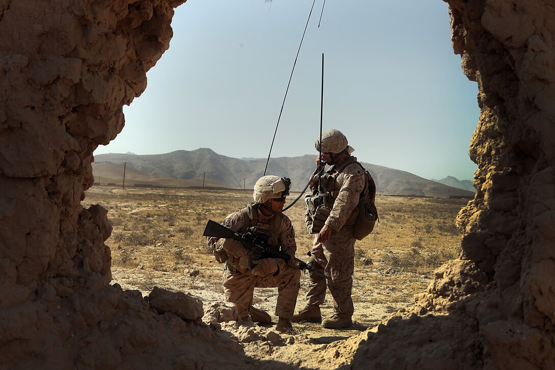 Sergeant Aaron Segovia, a squad leader with India Battery, 3rd Battalion, 12th Marine Regiment, Regimental Combat Team 2, radios in their position during their farthest patrol to the northern part of their area of operations in Kajaki, Sept. 29, 2010. The Marines’ mission was to search for any suspicious activity in that area.  Segovia, 27, is from Houston.