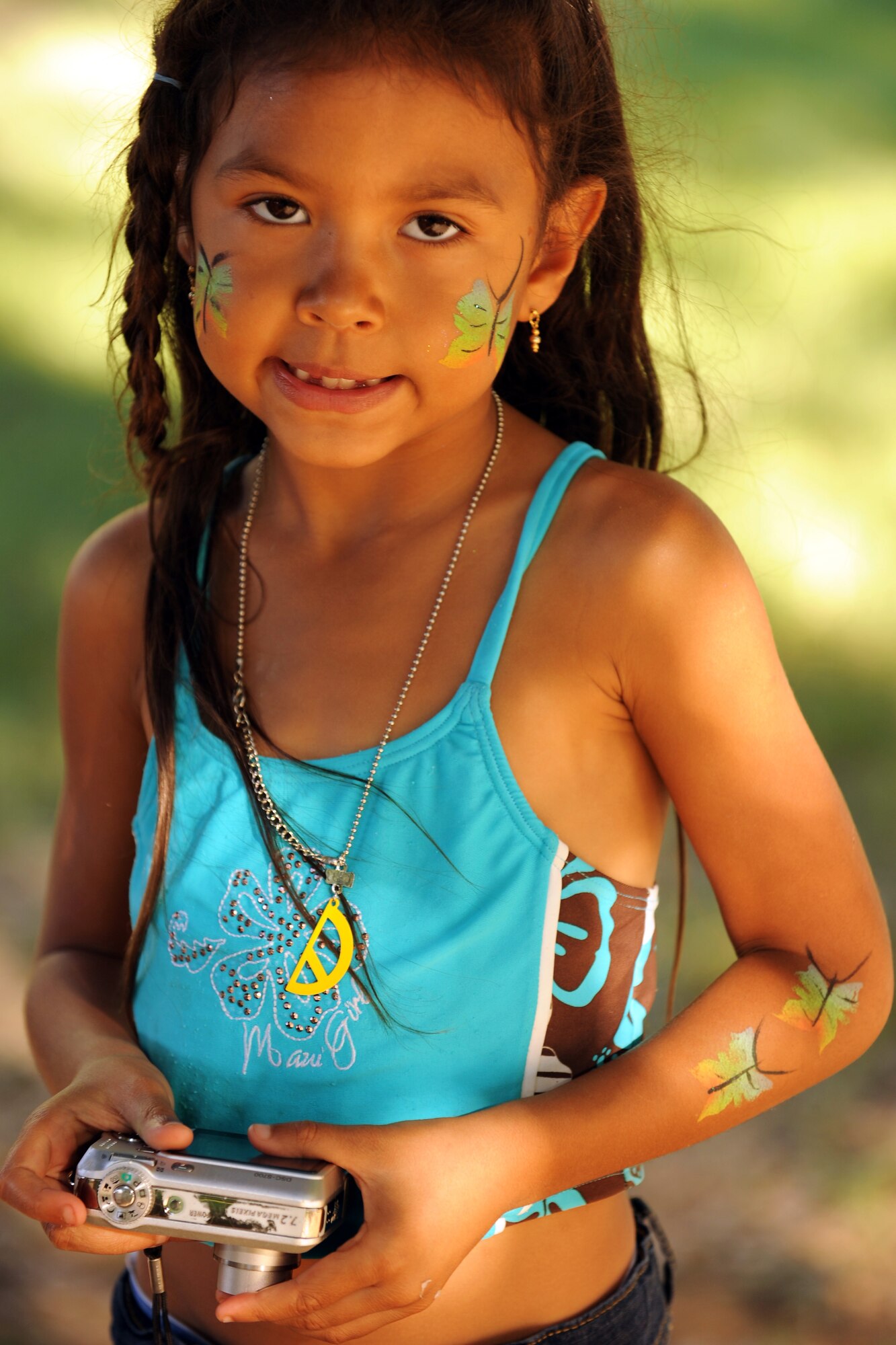 The daughter of Air Force Staff Sgt. Keith Ollmann, 452nd Security Forces Squadron, had butterflies painted on her during the 38th Annual Military Appreciation Picnic at March Air Reserve Base, Calif., Sept. 18. (U.S. Air Force photo by Tech. Sgt. Christine Jones)