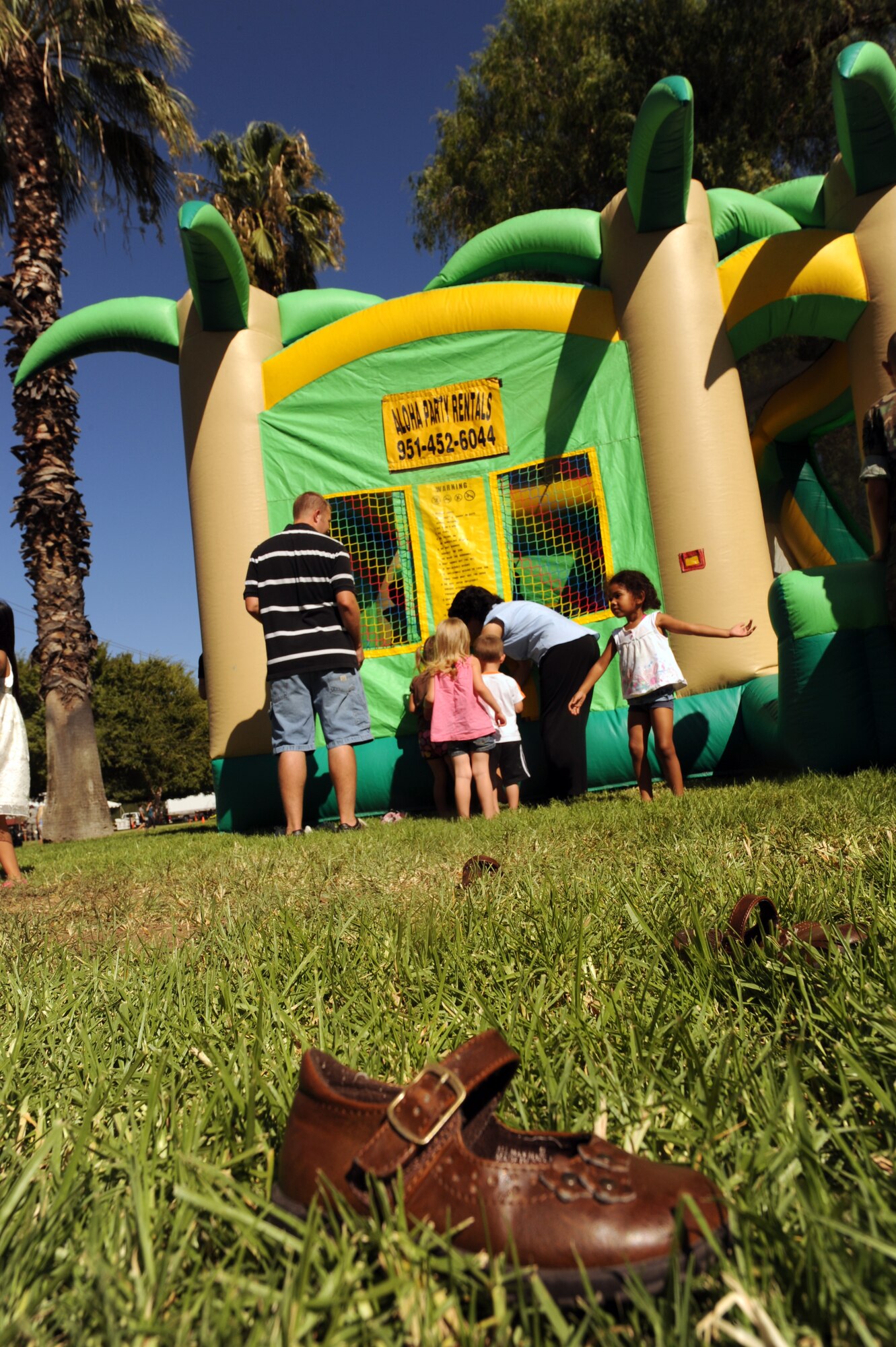 Children play in bounce house during the 38th Annual Military Appreciation Picnic at March Air Reserve Base, Calif., Sept. 18. (U.S. Air Force photo by Tech. Sgt. Christine Jones)