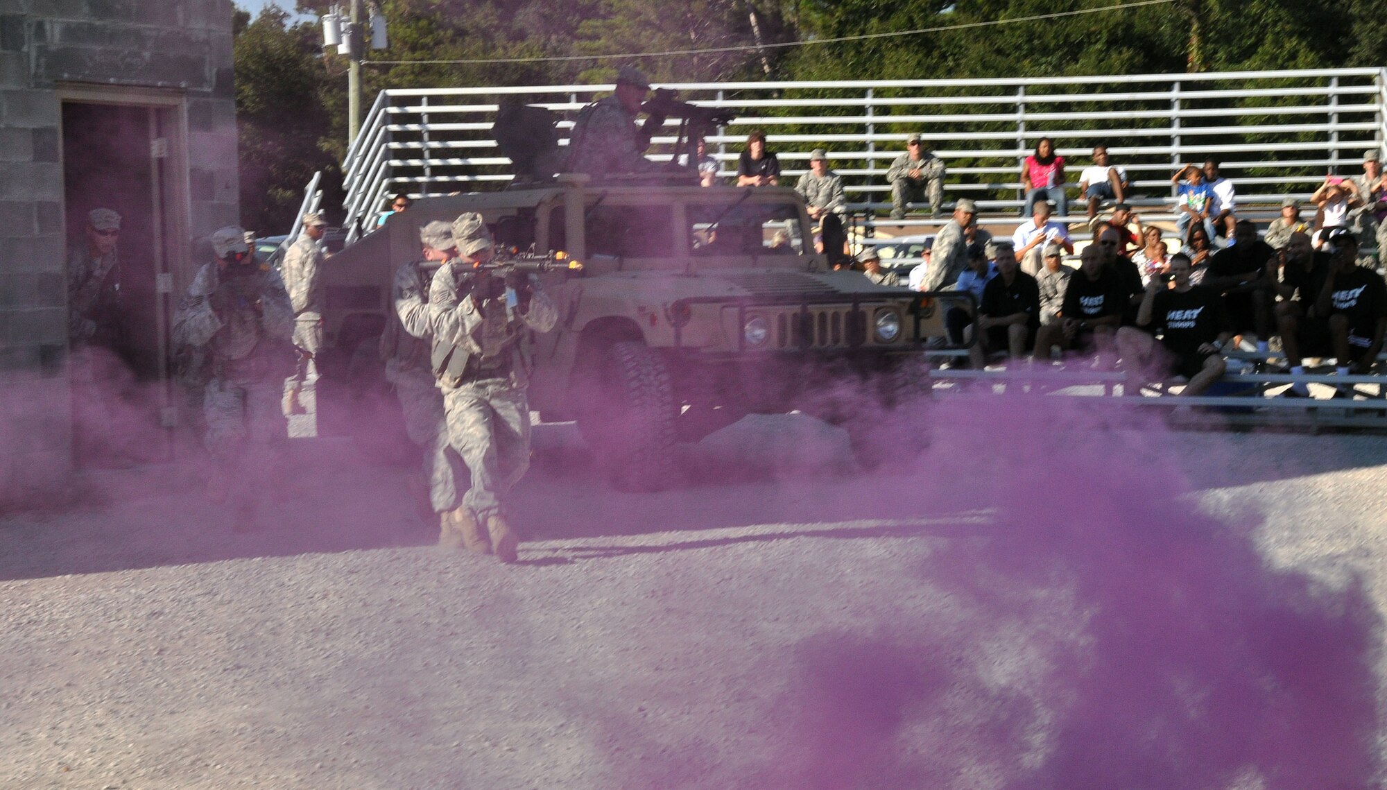 Airmen from the 96th Ground Combat Training Squadron perform an urban warfare scenario for members of the Miami Heat Sept. 30 here.  (U.S. Air Force photo/Staff Sgt. Stacia Zachary)