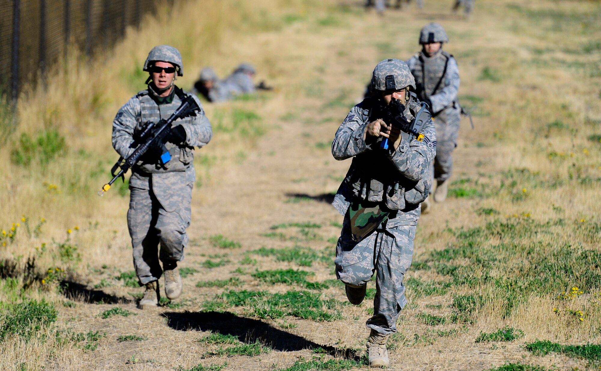 Airmen from the 75th Security Forces Squadron practice combat patrols during week-long Combat Readiness Training Course Sept. 24, 2010, at Hill Air Force Base, Utah.  The CRT course provides Airmen with the basic skills needed to deploy, to include tactical movements, land navigation and self aid buddy care. (U.S. Air Force photo/Senior Airman Michael Dillon)

