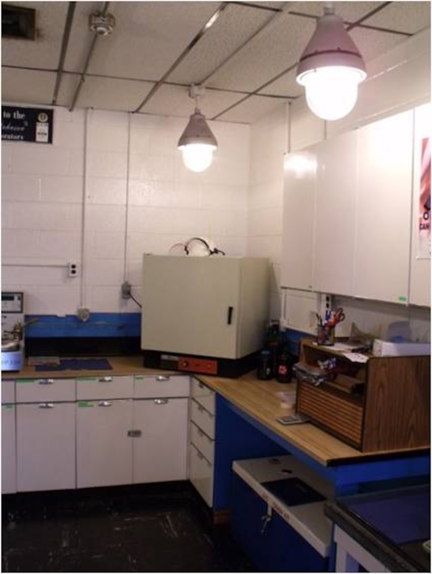 The fuels lab before the project, showing the worn out floor tiles and outdated paint. “It was a very blue and dismal work environment,” said Senior Airman John March. (Courtesy photo)