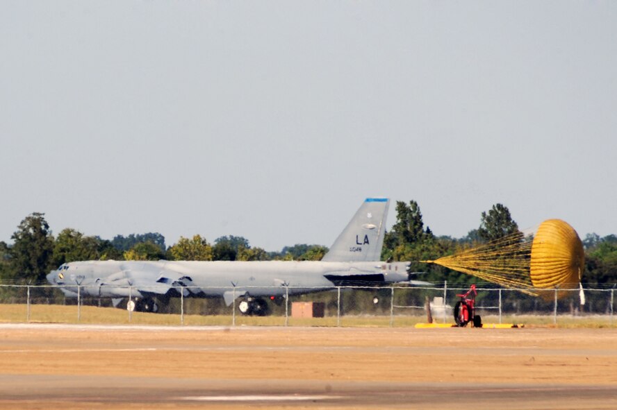 BARKSDALE AIR FORCE BASE, La. -- Col. Gregory Smith, 2nd Operations Group commander, lands a B-52H Stratofortress at Barksdale Air Force Base after his "fini" flight Sept 29. The "fini" flight is a long standing practice of both the United States and Royal Australian Air Forces.  (U.S. Air Force photo/Senior Airman Brittany Y. Bateman)(RELEASED)