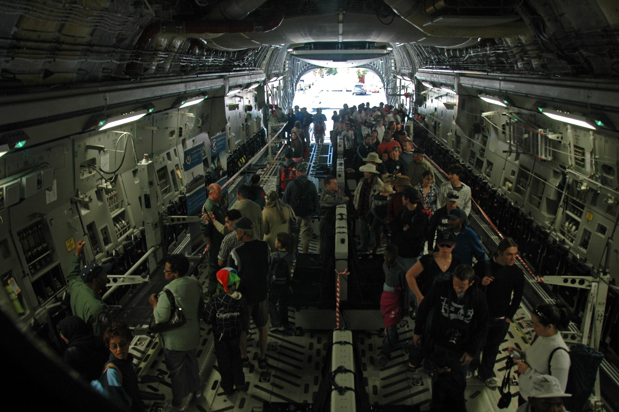 Visitors to the Africa Aerospace Defense air show at Ysterplaat Air Force Base Cape Town South Africa tour a C-17 Globemaster III manned by reservists from the 317th Airlift Wing. Tens of thousands of visitors, media members, and distinguished visitors from around the world learned about the C-17 during the five day air and trade expo.