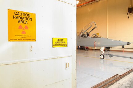 Randolph AFB, TX, 30 September 2010: A T-38 is towed from inside the lead lined inspection hangar after a nondestructive x-ray inspection after passing its phase inspection.  (U.S. Air Force photo/Steve Thurow)
