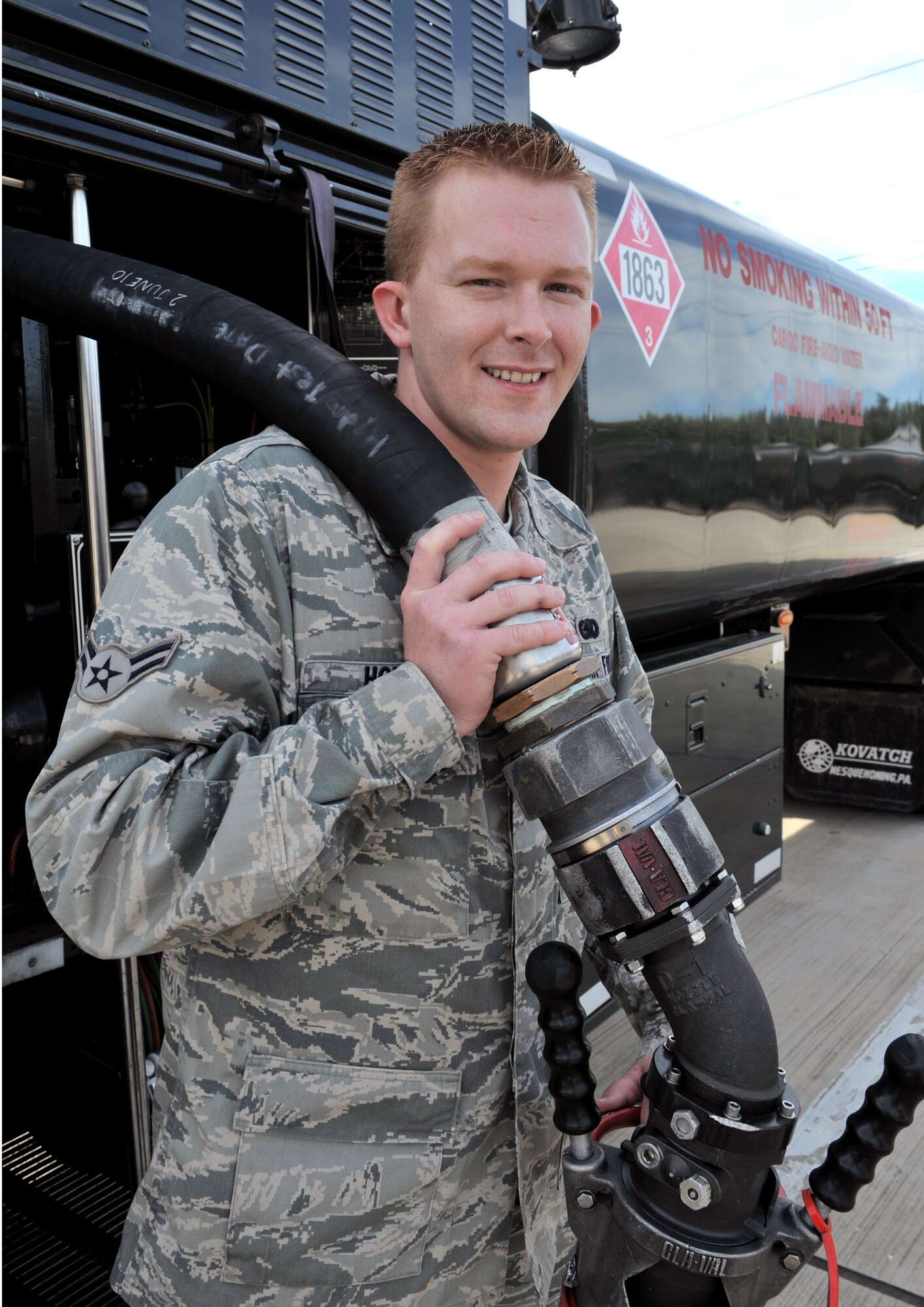 Airman 1st Class Brandon Horne poses with a fuel hose Sept. 28, 2010, at Shaw Air Force Base, S.C. Airman Horne performed self aid buddy care to an all-terrain vehicle accident victim Sept. 17, 2010, which help save his life. Airman Horne is a 20th Logistics Readiness Squadron fuel truck operator. (U.S. Air Force photo/Airman 1st Class Tabatha L. Duarte)