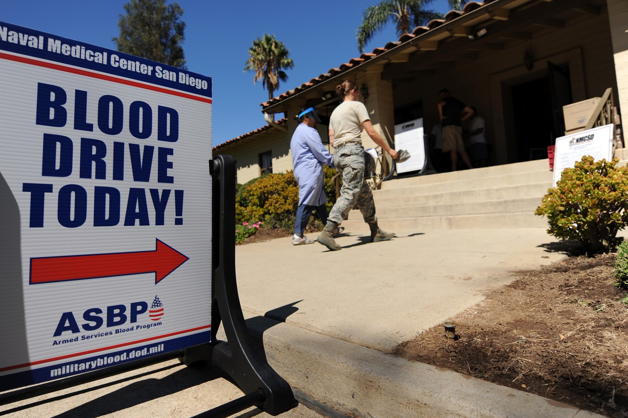 U.S. Air Force members donate blood with assistance from personnel with Naval Medical Center San Diego, at March Air Reserve Base Blood Drive, Sept. 18, 2010. (U.S. Air Force photo by Tech. Sgt. Christine Jones)