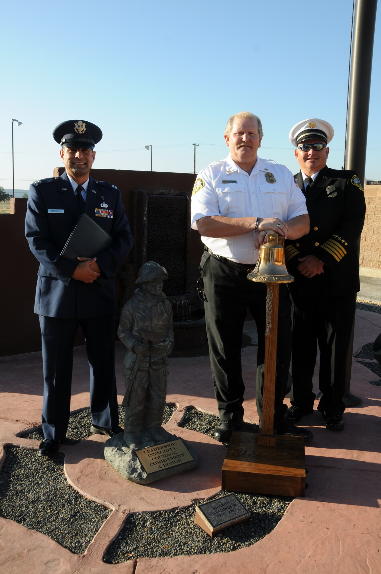 Firefighters at March Air Reserve Base held a ceremony in remembrance of September 11, 2001 in front of their new 9/11 memorial, September 11, 2010. (U.S. Air Force photo by MSgt Julie Avey)