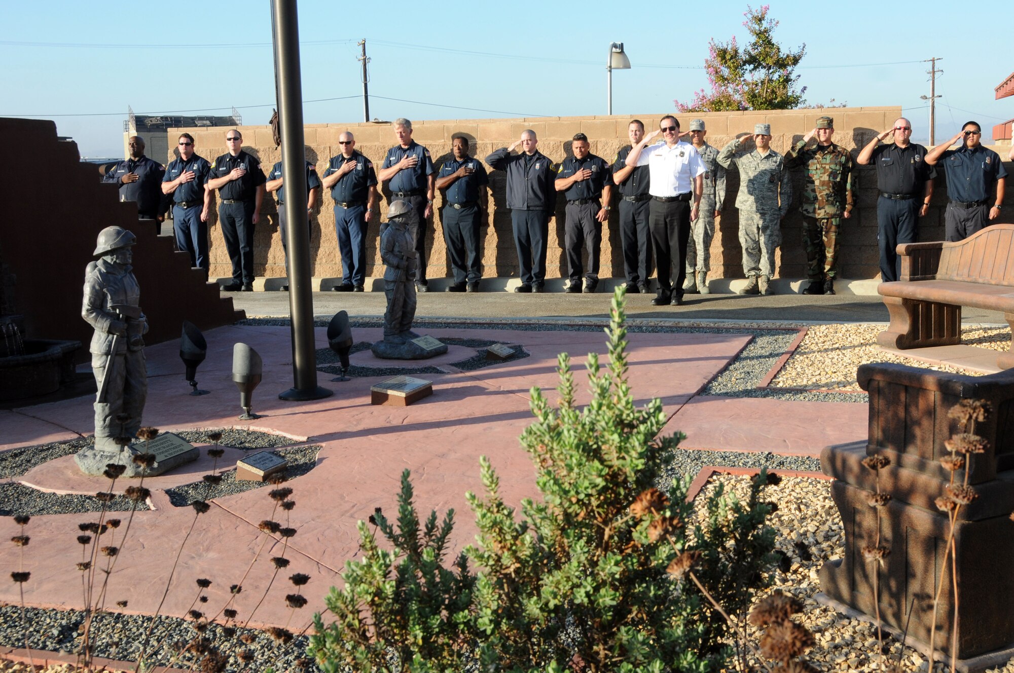 Firefighters at March Air Reserve Base held a ceremony in remembrance of September 11, 2001 in front of their new 9/11 memorial, September 11, 2010. (U.S. Air Force photo by MSgt Julie Avey)