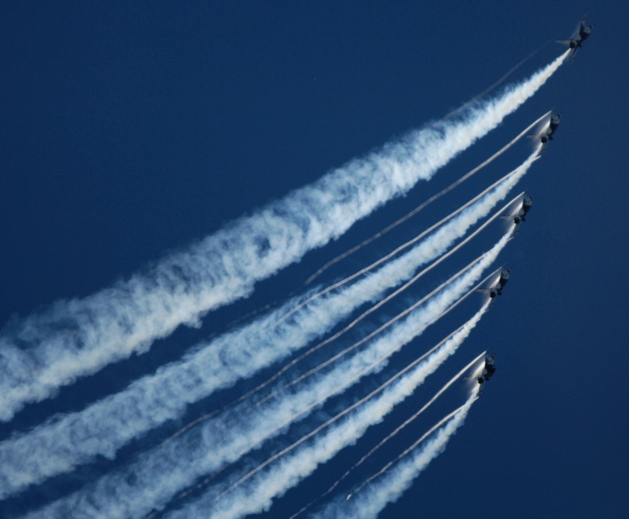 The U.S. Air Force Air Demonstration Squadron Thunderbirds perform over the skies of McConnell Air Force Base, Kan. Sept. 26, 2010. More than 95,000 guests attended McConnell’s 2010 Open House and Air Show, a two-day event. The Thunderbirds have been performing for audiences around the world for since Feb. 1953. (U.S. Air Force photo/Airman 1st Class Armando A. Schwier-Morales)