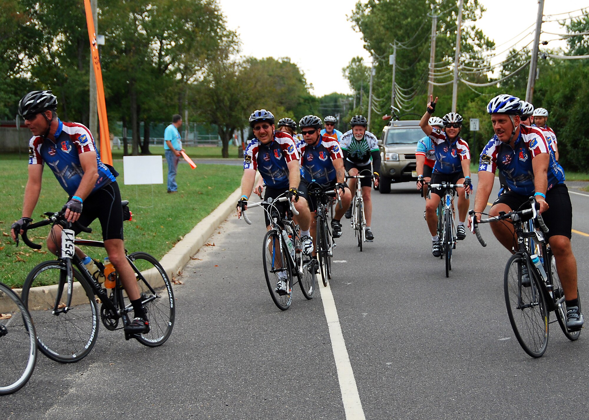 JOINT BASE MCGUIRE-DIX-LAKEHURST, N.J. -- Members of the McGuire-Dix-Lakehurst cycling team round a corner during the annual two-day Multiple Sclerosis City to Shore Ride 2010 Sept. 25-26. The team of Air Force and Army servicemembers and civilians raised more than $13,000 for the National Multiple Sclerosis Society. (U.S. Air Force photo/Master Sgt. Donna Jeffries)