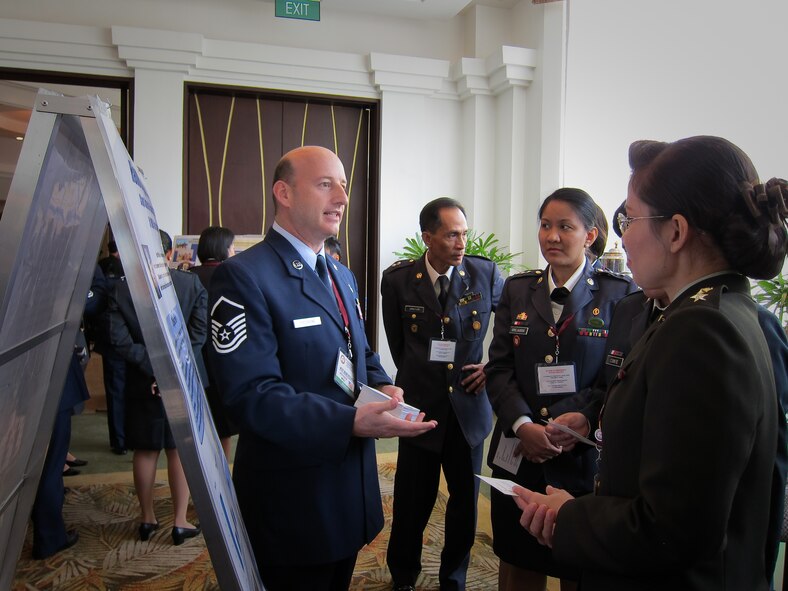 Master Sgt. Mark Picchione, 51st Medical Group, briefs Thai nurses on the Hand-hygiene Pilot Program at the Asia-Pacific Military Nursing Symposium, Mandaluyong City, Philippines. (Courtesy photo)